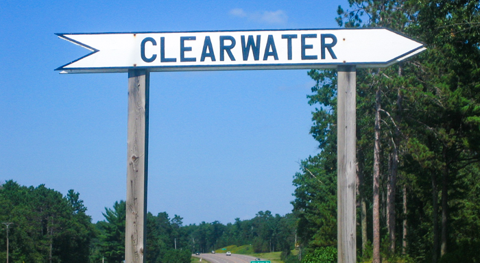 Clearwater arrow sign pointing from highway