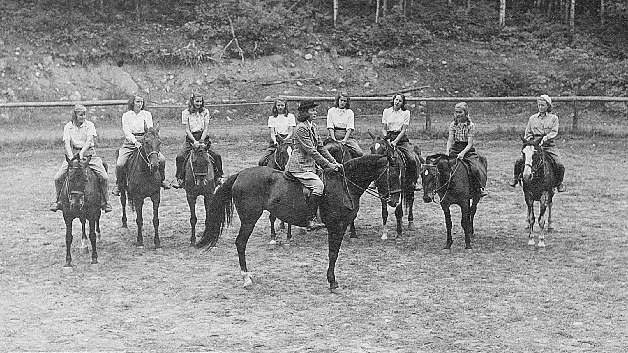 1946 photo of campers riding horses